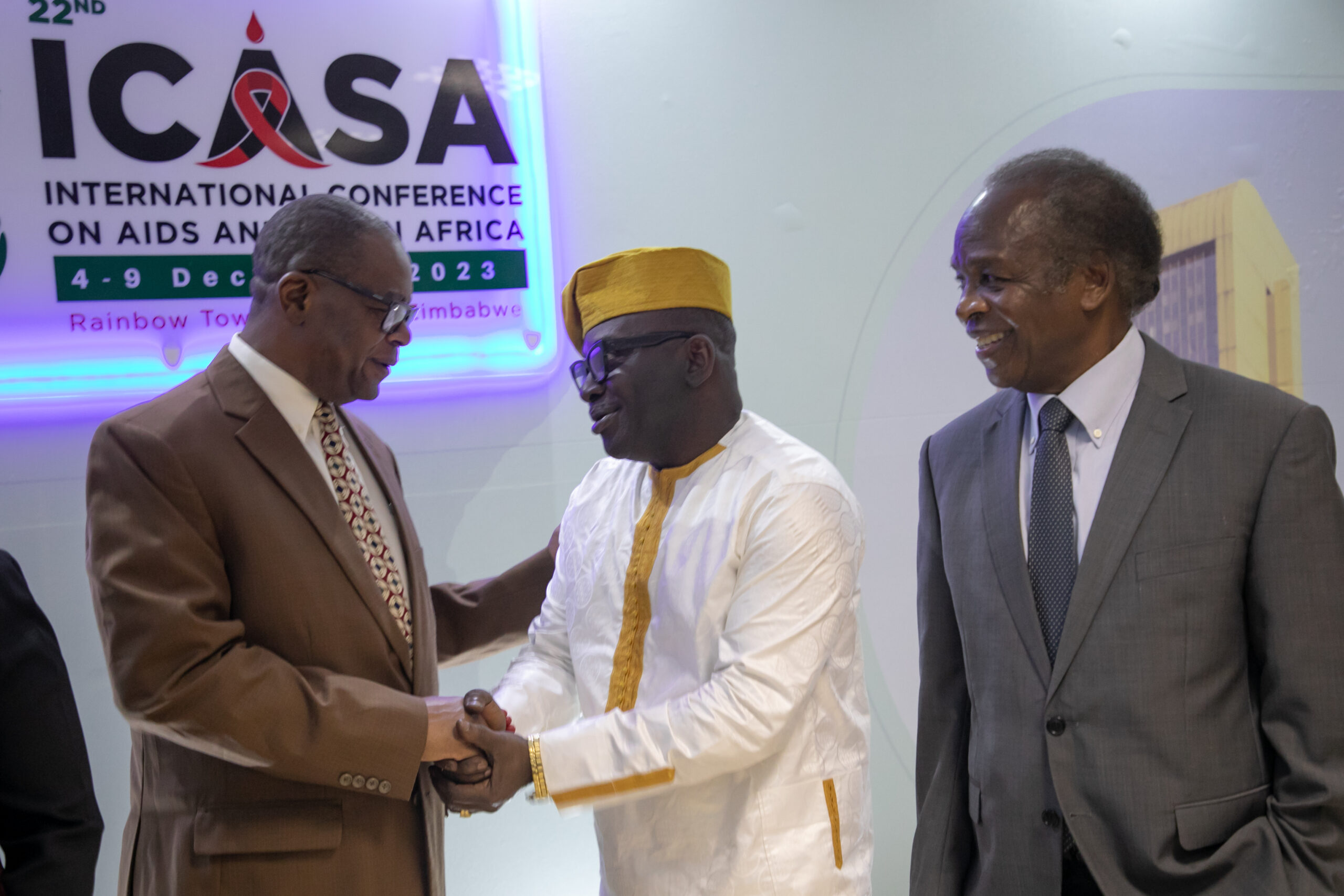 Minister of Health and Child Care, Hon. Dr. Douglas Mombeshora, • Director of the International Conference on AIDS and STIs in Africa Secretariat, Mr. Luc Armand Bodea
