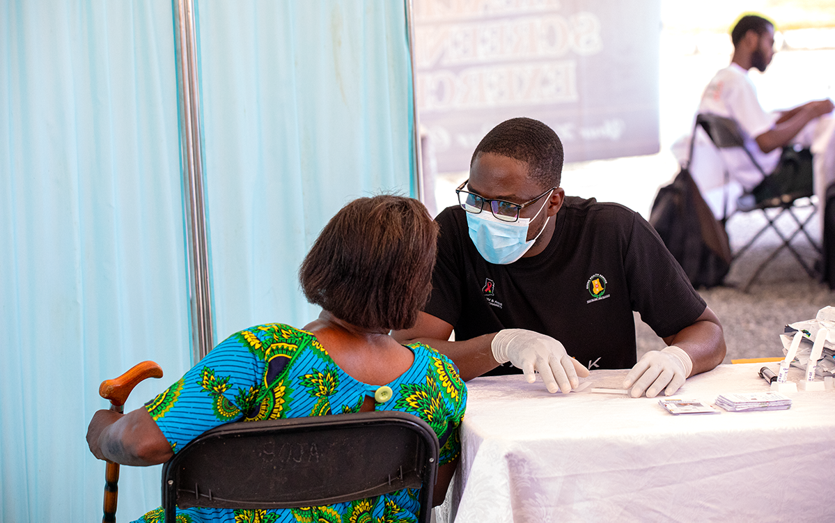SAA Team counselling a participate during pre-screening.